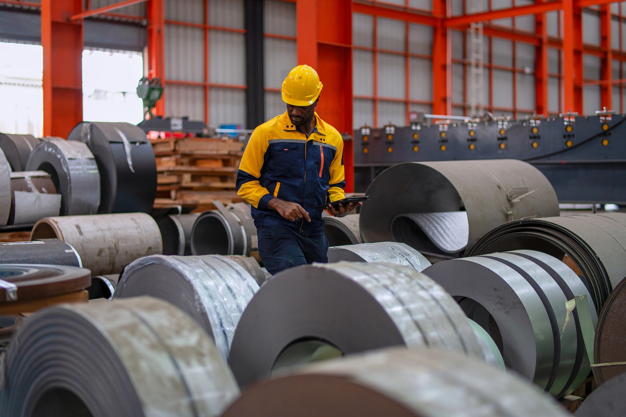 Metalworker fabricating steel in a workshop